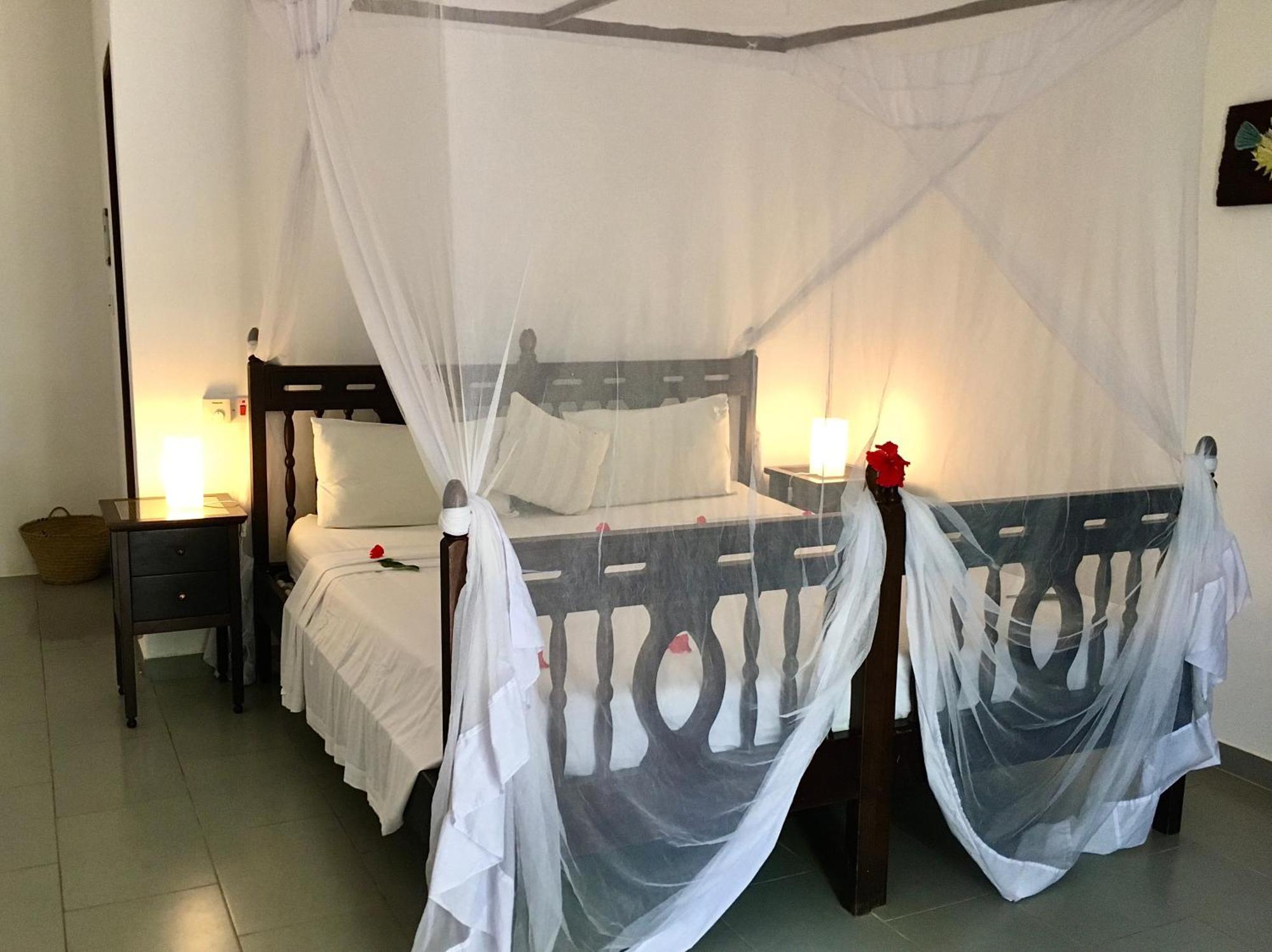 Kibanda Lodge And Beach Club Нунгви Номер фото