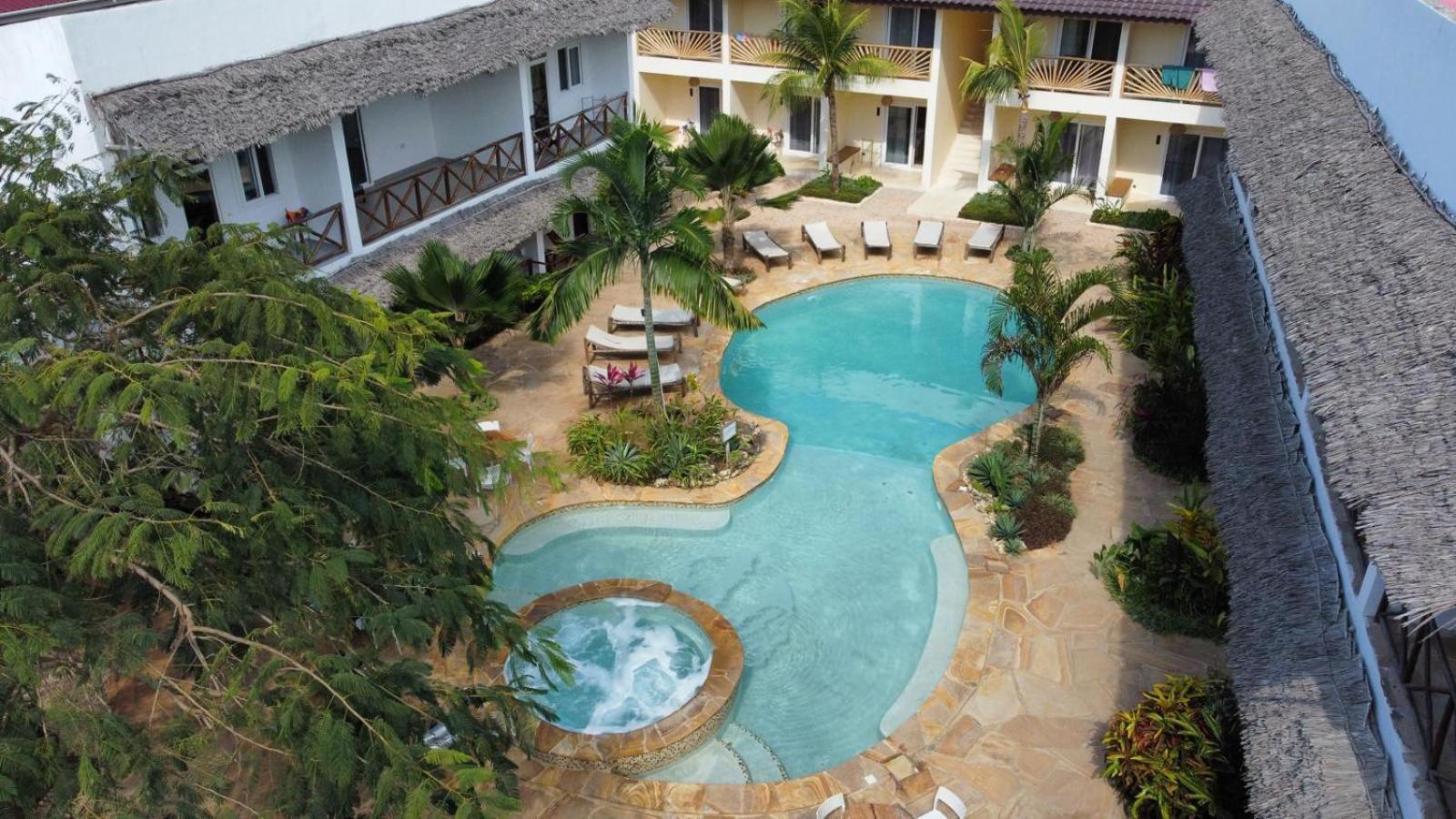 Kibanda Lodge And Beach Club Нунгви Экстерьер фото